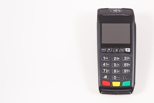 Payment terminal, credit card reader using for cashless paying. Finance concept. Place for text