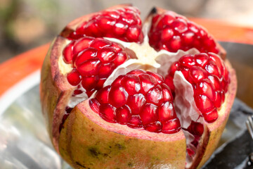 Slices of ripe pomegranate (Punica granatum) fruit shot