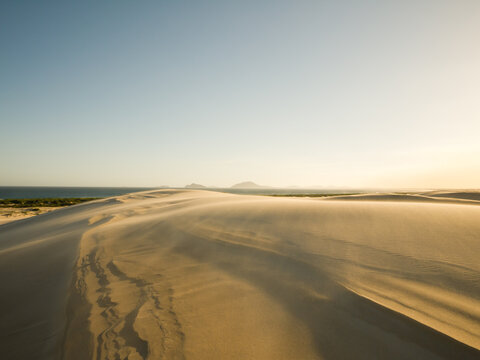 Sand blowing across a sand dune