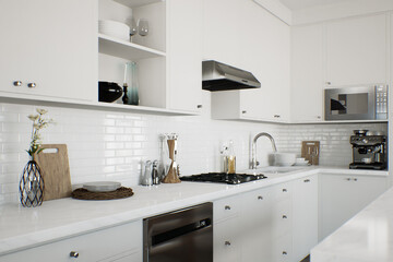 Fototapeta na wymiar White kitchen with kitchen appliances and utensils