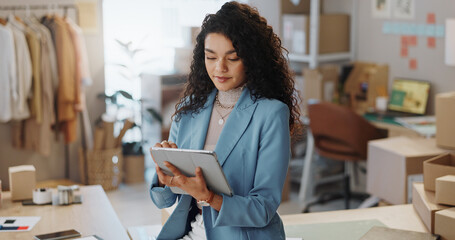 Woman, fashion designer and tablet for research in logistics or small business management at...