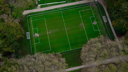 Football field. Training center in forest