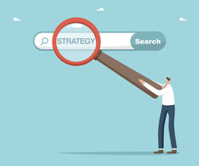 Searching for business development strategies to achieve great success, searching for the necessary information for new opportunities, man points with magnifying glass at the search bar with strategy.