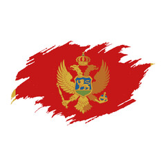 National flag of Montenegro with brush stroke effect on white background