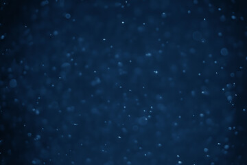 Abstract bokeh lights with blue background