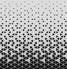 Halftone triangles pattern. Abstract geometric gradient background.