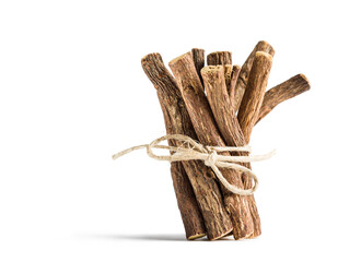 Tied liquorice sticks on white background.