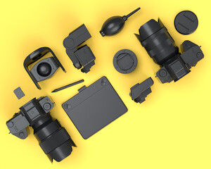 Top view of monochrome designer workspace and photography gear on yellow