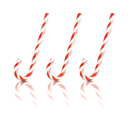 Three Christmas candy canes isolated