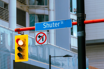Shutter St. sign and stoplight in Toronto, Canada