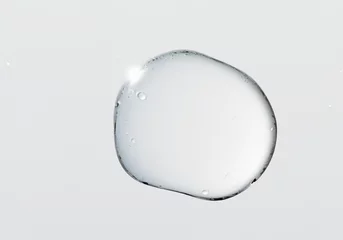 Fotobehang 白い背景に浮かぶ水滴 © STORY