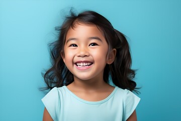 Portrait of a Cute and Innocent Fictional Little Girl Smiling. Joyful Facial Expression, Isolated on a Plain Colored Background. Generative AI.