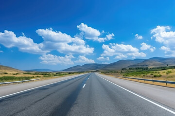Fototapeta premium Highway and a blue sky. Asphalt road and beautiful countryside landscape. AI generated
