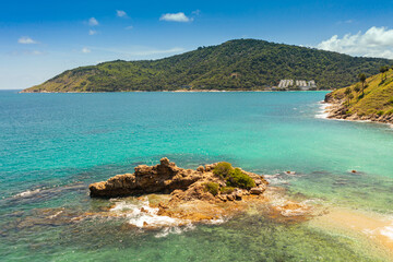 .aerial view around mini isle in front Ya Nui beach. .The clear green sea water can be seen through the sea..green sea white sand beach 4K video for creative nature and travel concept.