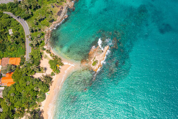 .aerial view around mini isle in front Ya Nui beach. .The clear green sea water can be seen through the sea..green sea white sand beach 4K video for creative nature and travel concept.