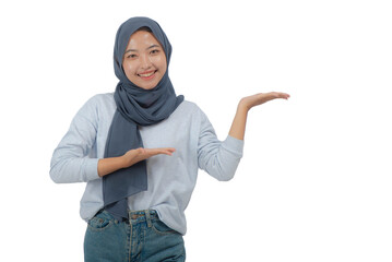 Young Asian Hijab Woman with Presenting Hands Pose