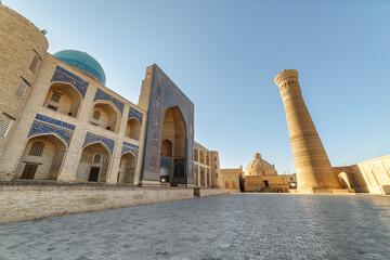 Fototapeta premium Awesome view of the Mir-i-Arab Madrasa and the Kalan Minaret