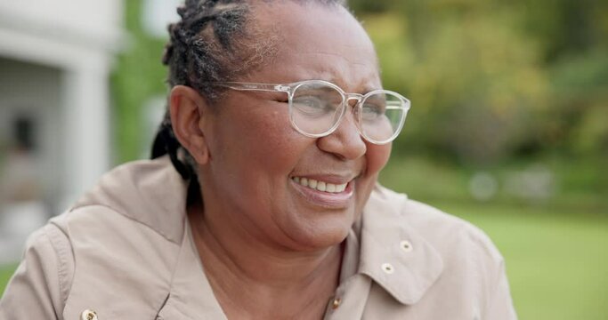 Senior, woman and happy with glasses in garden, retirement village and good memory of life to smile. African, old person and thinking with relax in wellness, nature and sunshine in care environment