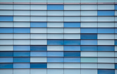 White and blue background of office glass buildings