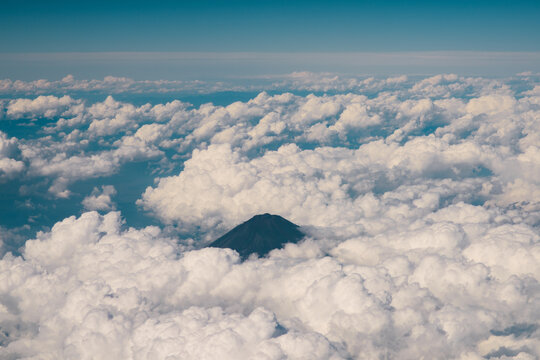 Mount Fuji Hidden in Clouds and Fog Taken on a Plane from Above