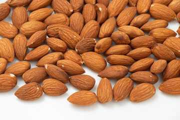 Almond baked on white background. Bakery ingredients and Health food.