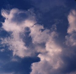 Sky landscape. Mesmerizing clouds on the background of sunset.