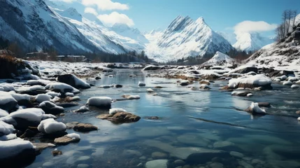 Foto op Plexiglas anti-reflex The untamed beauty of an icy river flows beneath the snow-capped peaks of the alps, surrounded by rugged rocks and frozen glaciers, as the winter sky watches over the tranquil landscape © Envision