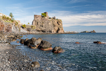 The norman castle of Aci Castello in eastern Sicily, built on a lava rock promontory
