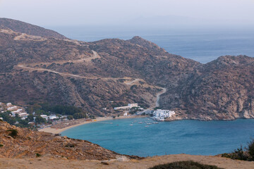 Fototapeta premium Panoramic view of the popular Mylopotas beach and the Aegean Sea in the background