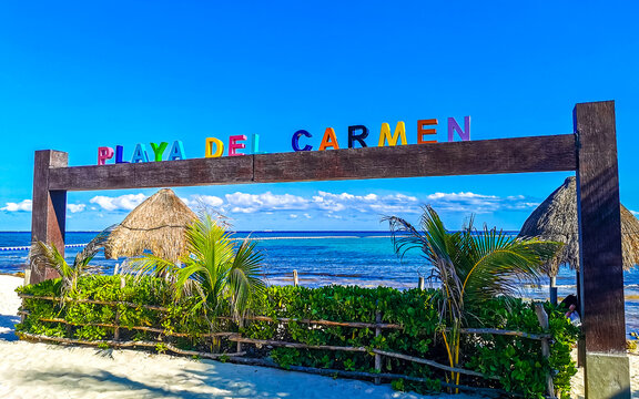 Colorful Playa del Carmen lettering sign symbol on beach Mexico.