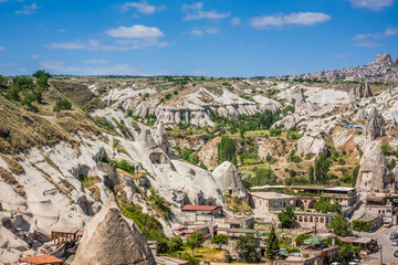 Fototapeta premium Rocky landscape in Cappadocia, Turkey. Travel in Cappadocia. Amazing landscape view of Uchisar town in Cappadocia Turkey
