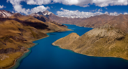 View from Yamdrok High Pass of the Turquoise Lake (16,860ft) on the Tibetan Plateau in Tibet. 