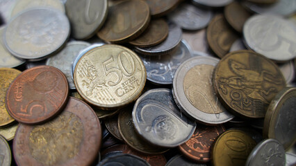 Coins from different countries of the world. Polish Zloty, Czech Crowns, Euro, Russian Ruble