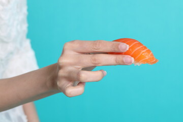 Hand with Sushi