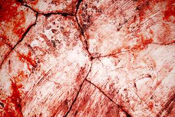 Red wall scratches which can be used as a horror background. Old shabby blood paint and plaster cracks