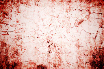 Red wall scratches which can be used as a horror background. Old shabby blood paint and plaster cracks