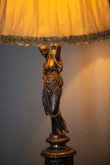 Vintage lamp with sculpture as an easel 