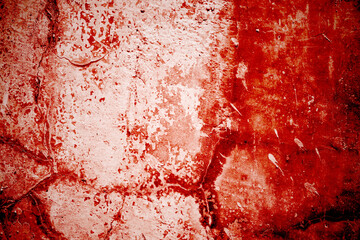 Red wall scratches which can be used as a horror background. Old shabby blood paint and plaster cracks