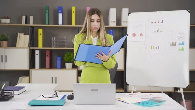 Businesswoman memorizing presentation.