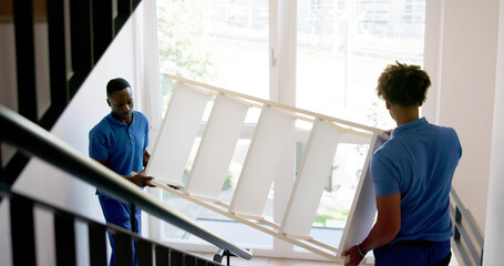 Professional Movers Unloading Furniture