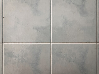 Grey concrete tiles background