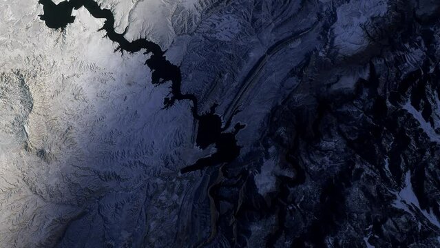 Flying over river and mountains, Wyoming and Utah border, United States, sunrise animation satellite view. Based on image by Nasa