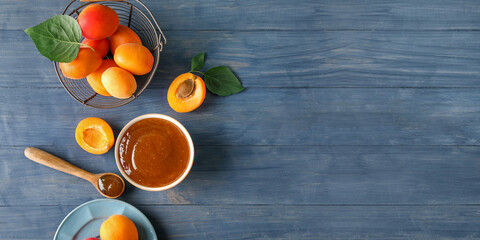 Composition with sweet apricot jam on wooden background with space for text, top view - obrazy, fototapety, plakaty