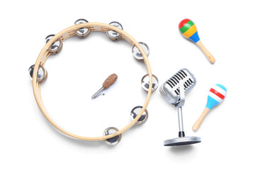 Fototapeta premium Different musical instruments and microphone on white background