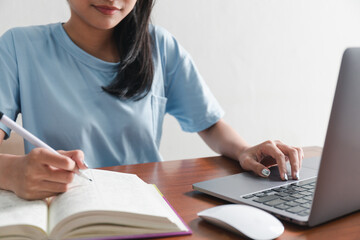 girl student study online with teacher, happy young woman with internet learning in library, distance education