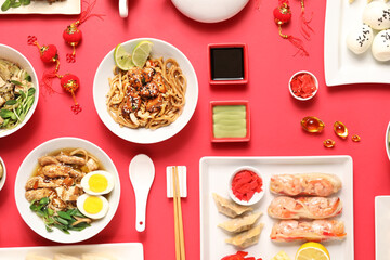 Composition with different Chinese food on red background