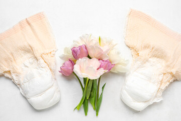 Period panties with tulips on white background
