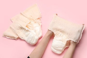 Woman with period panties on pink background