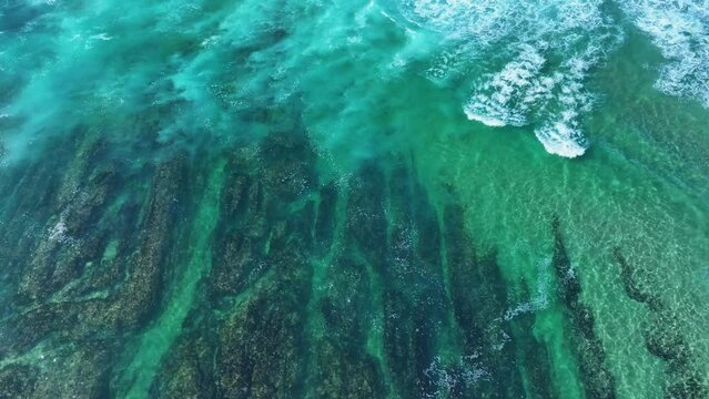Colors and rock formations of El Sable beach. Coastal landscape in the town of Tagle. Aerial view from a drone. Suances Municipality. Cantabrian Sea. Cantabria. Spain. Europe