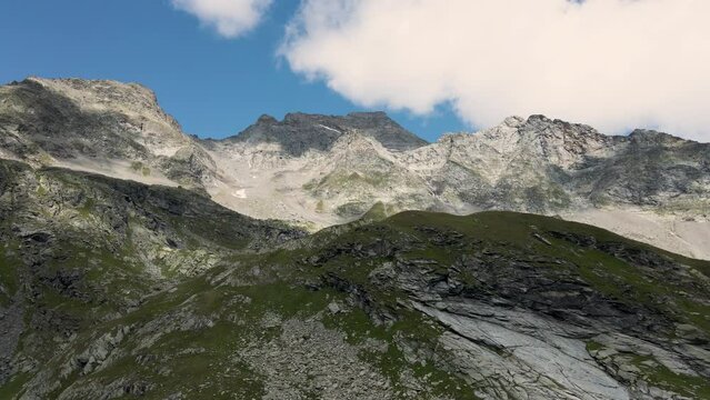 Aerial drone view of Pizzo Tamb&ograve; and Cime di Val Loga in summer - Italian Alps